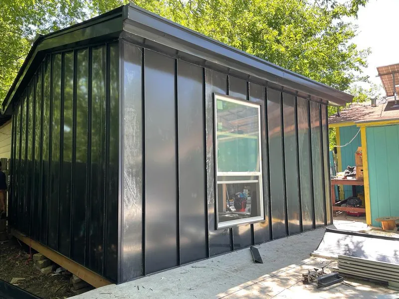 Black standing seam metal wall panels for Metal Roof Installation in Montpelier