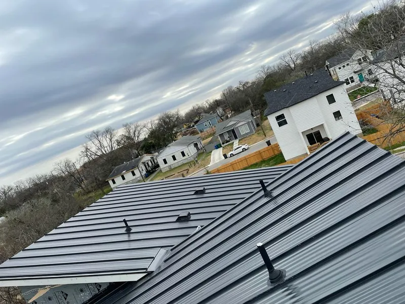 Standing seam metal roof panels with vents for Skylight Repair in Montpelier